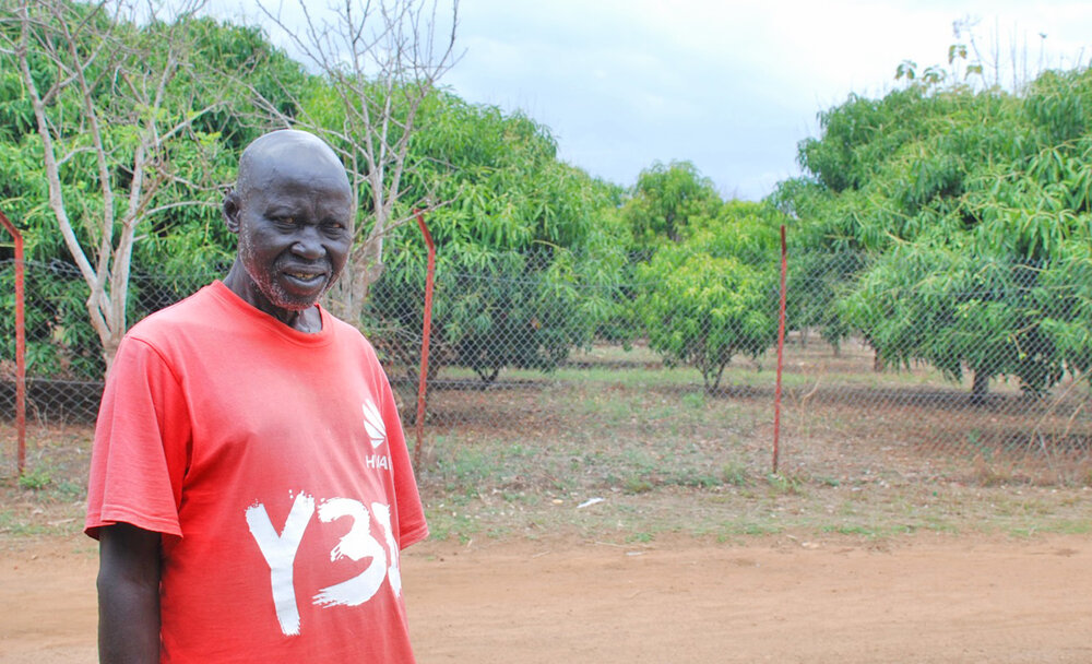 Phillip in one part of the orchard at Hope For South Sudan.