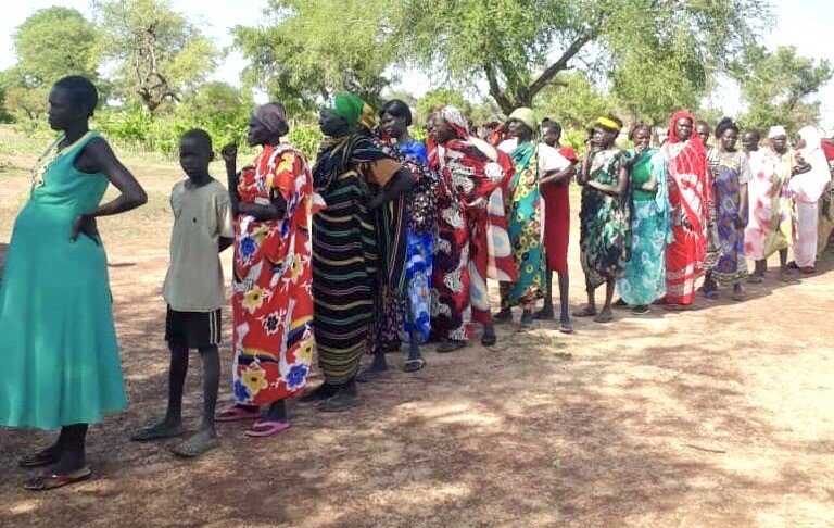Pictured above: community women and children near New Life Ministry (along the border of Darfur) wait in line for soap distribution yesterday.&nbsp;Hope For South Sudan (along the border of Uganda) just received their supplies and will also begin distribution soon to their neighbors in need.